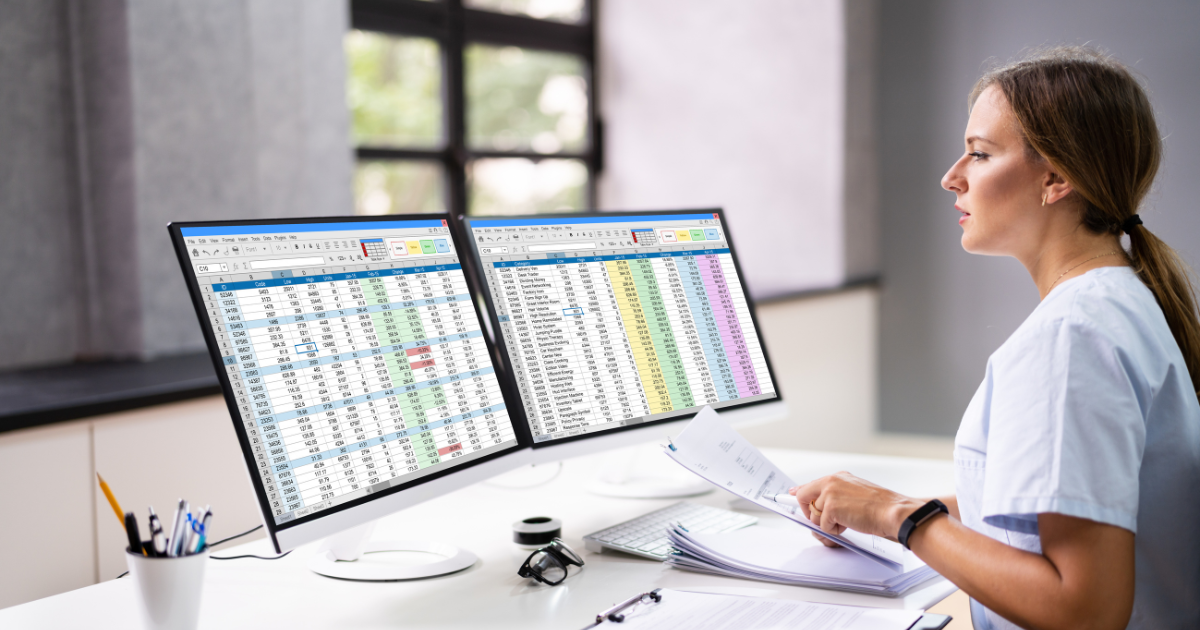 Woman looking at codes on computer